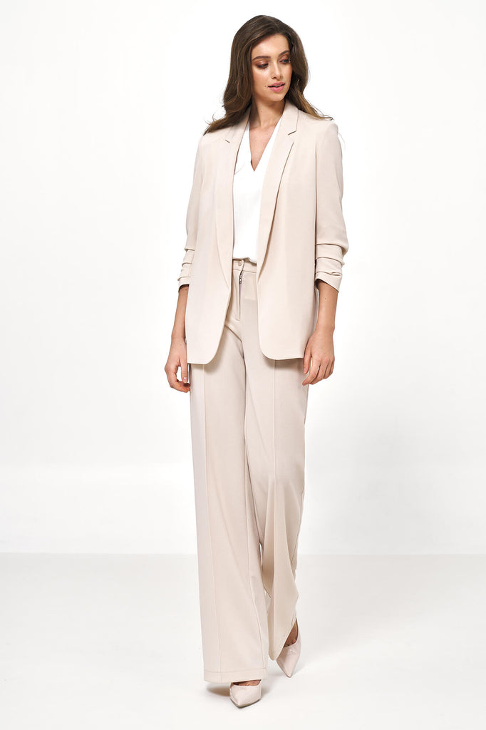 Ensemble pantalon et veste beige à  col tailleur